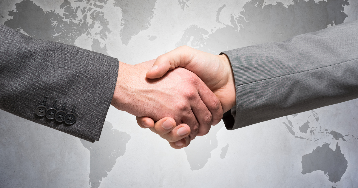 Illustration of global business contract negotiations with legal documents, a gavel, and international flags representing cross-border legal challenges.